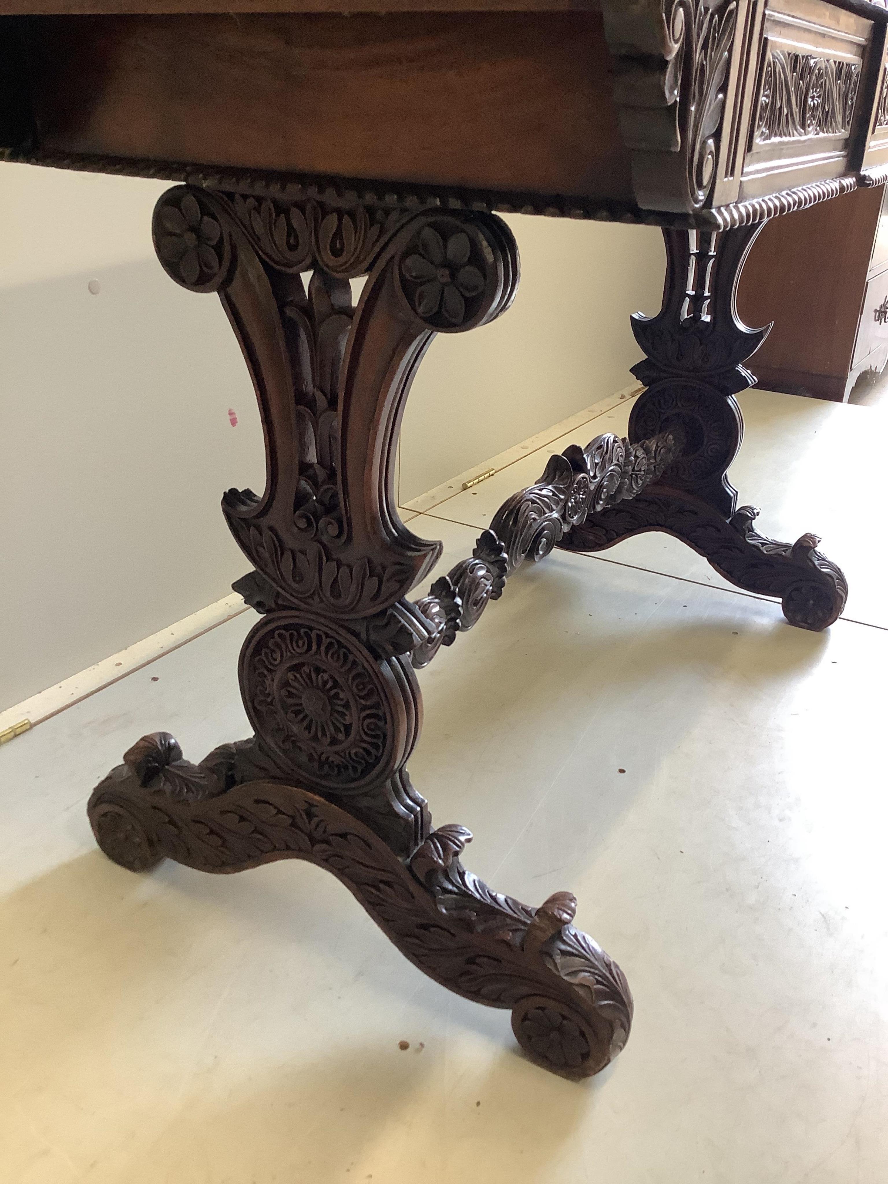 A 19th century Anglo Indian rosewood two drawer centre table, width 120cm, depth 50cm, height 75cm. Condition - fair